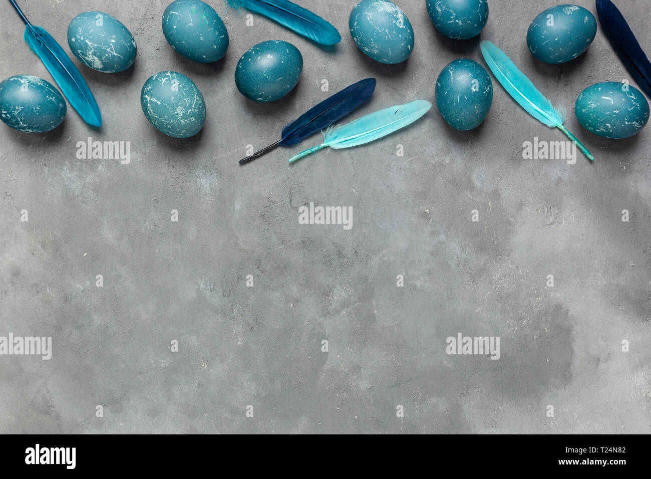 Easter composition on gray textured background with space for text. Gray background - concrete structure Stock Photo