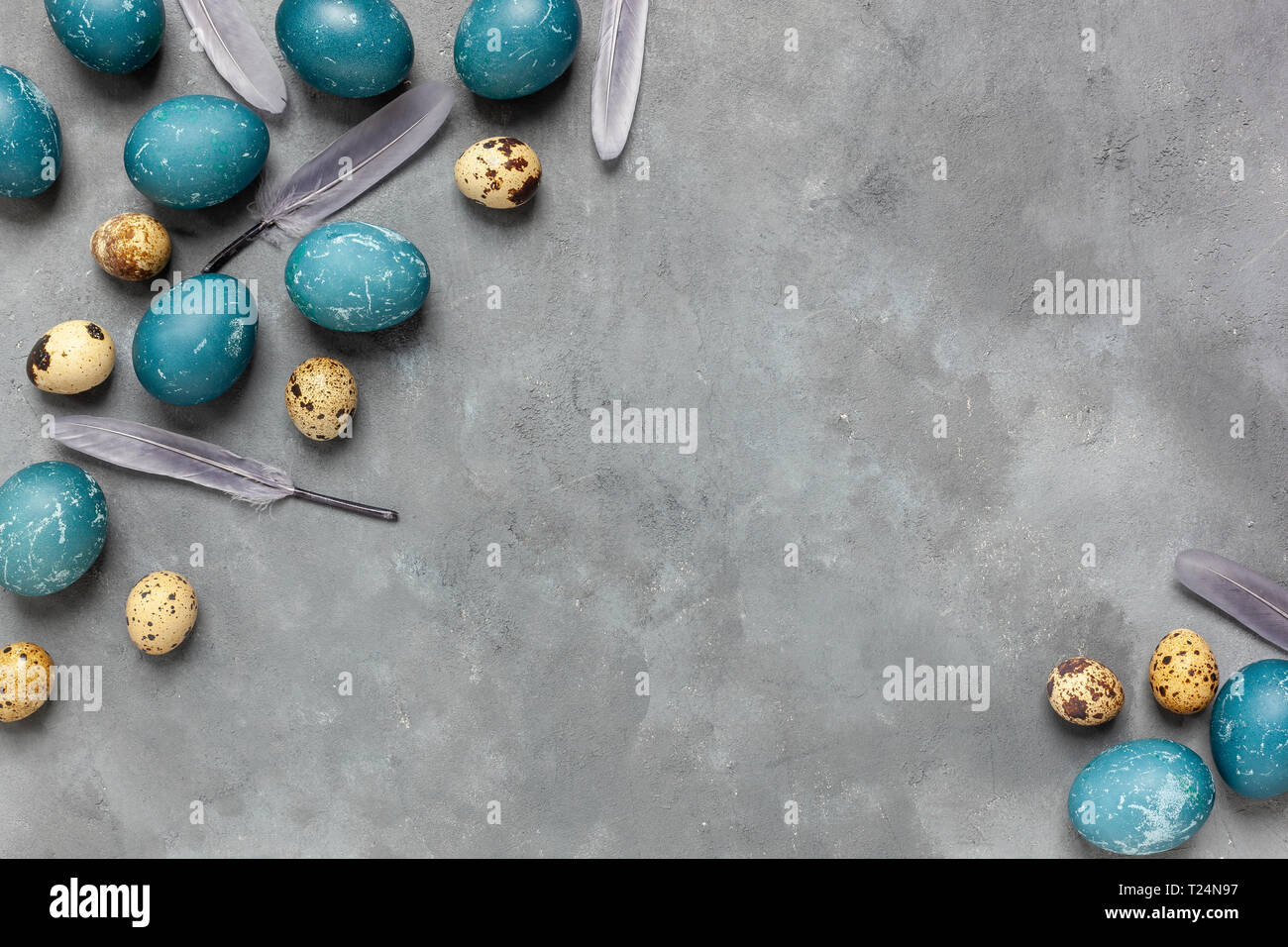 Easter composition on gray textured background with space for text. Gray background - concrete structure Stock Photo