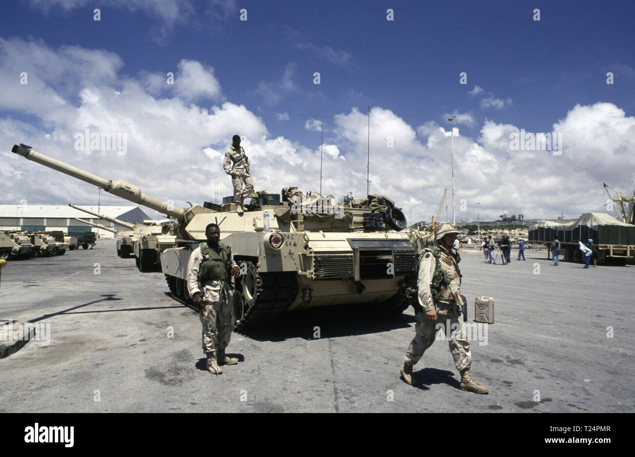 30th October 1993 U.S. Army M1A1 Abrams tanks of the 24th Infantry Division, 1st Battalion of the 64th Armored Regiment, lined up in the new port in Mogadishu, Somalia where they have just arrived by sea. Stock Photo