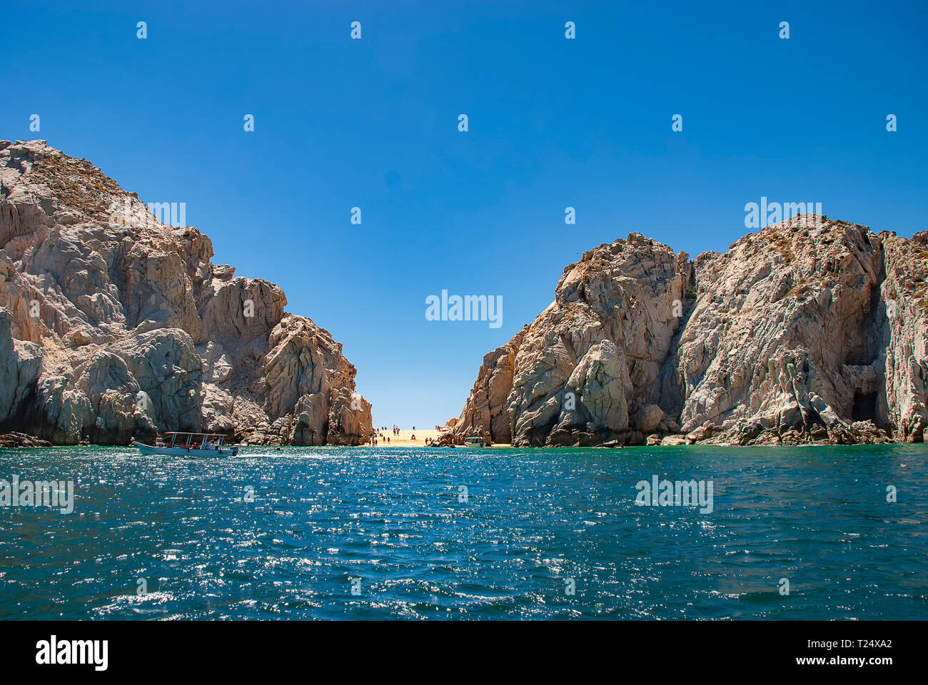 Lovers Beach between the towering cliffs in Cabo San Lucas, Mexico Stock Photo