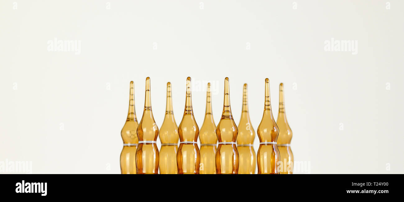 Set of transparent glass ampoules isolated on white background Stock