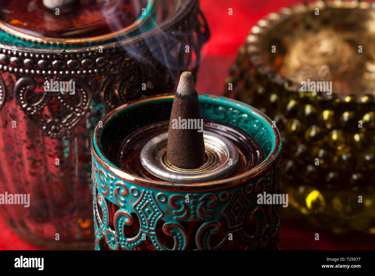 Burning aromatic incense cones Stock Photo Alamy