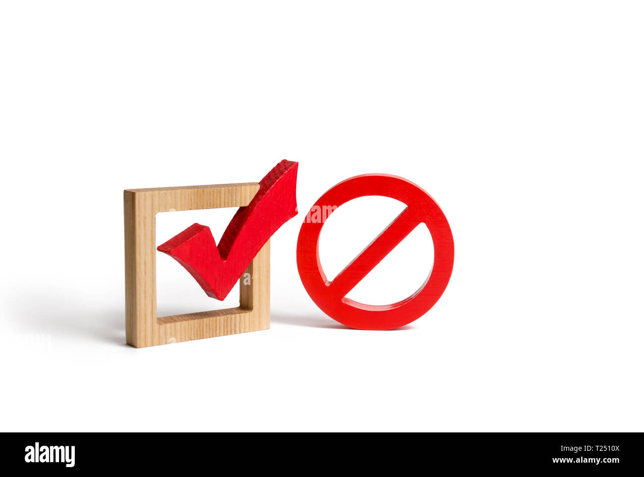 A red check mark and a NO symbol. lack of choice or election of the state. Restriction of rights and freedoms. No option, unavailability. Laws on proh Stock Photo