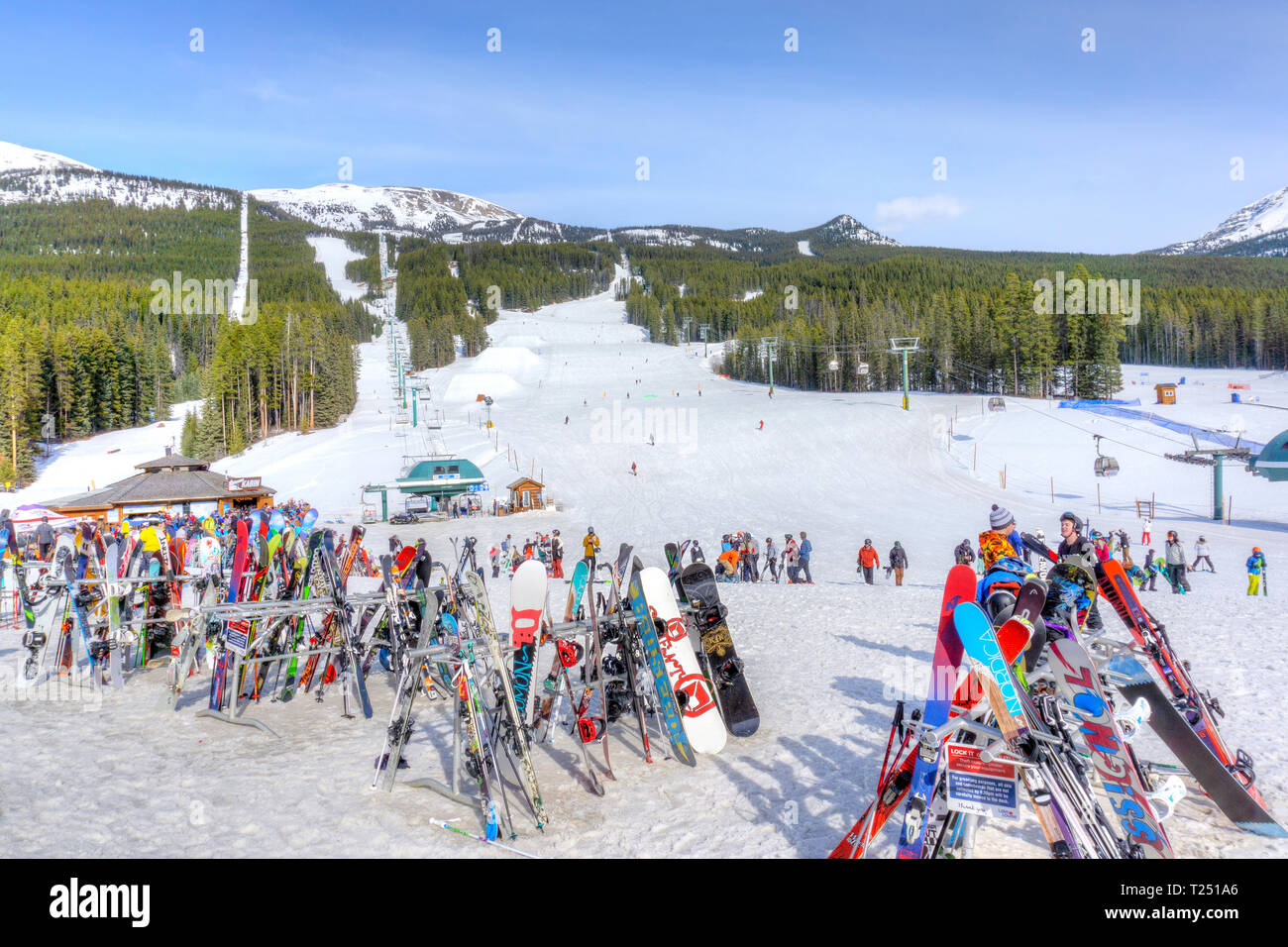 LAKE LOUISE, CANADA MAR 23, 2019 Skis and snowboards on racks at