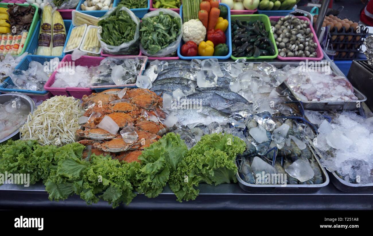 asian street food market with fresh food Stock Photo - Alamy