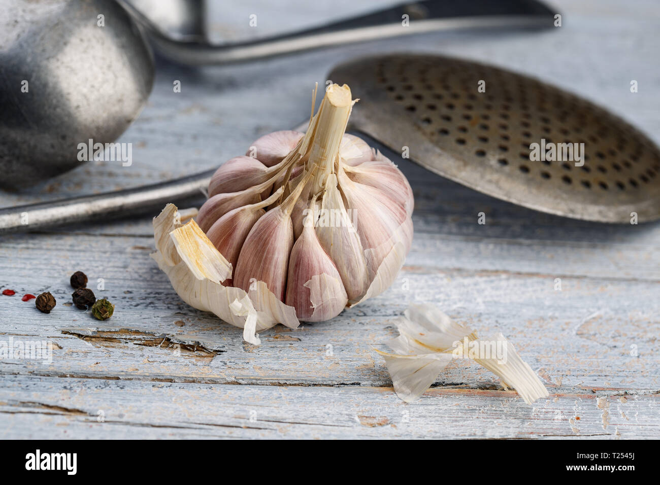Fresh whole Garlic Bulb on wooden board Stock Photo