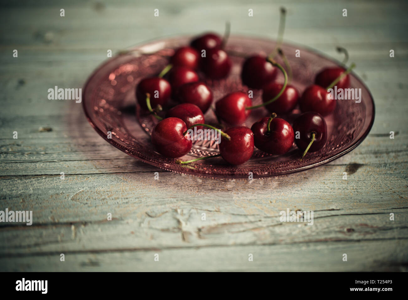Ripe and bright red sweet cherries Stock Photo