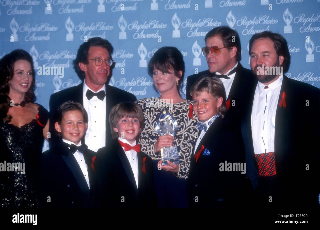 CULVER CITY, CA - MARCH 8: (L-R) Actress Debbe Dunning, actor Jonathan Taylor Thomas, actor Tim Allen, actor Taran Noah Smith, actress Patricia Richardson, actor Zachery Ty Bryan, actor Earl Hindman and actor Richard Karn attend the 20th Annual People's Choice Awards on March 8, 1994 at Sony Picture Studios in Culver City, California. Photo by Barry King/Alamy Stock Photo Stock Photo
