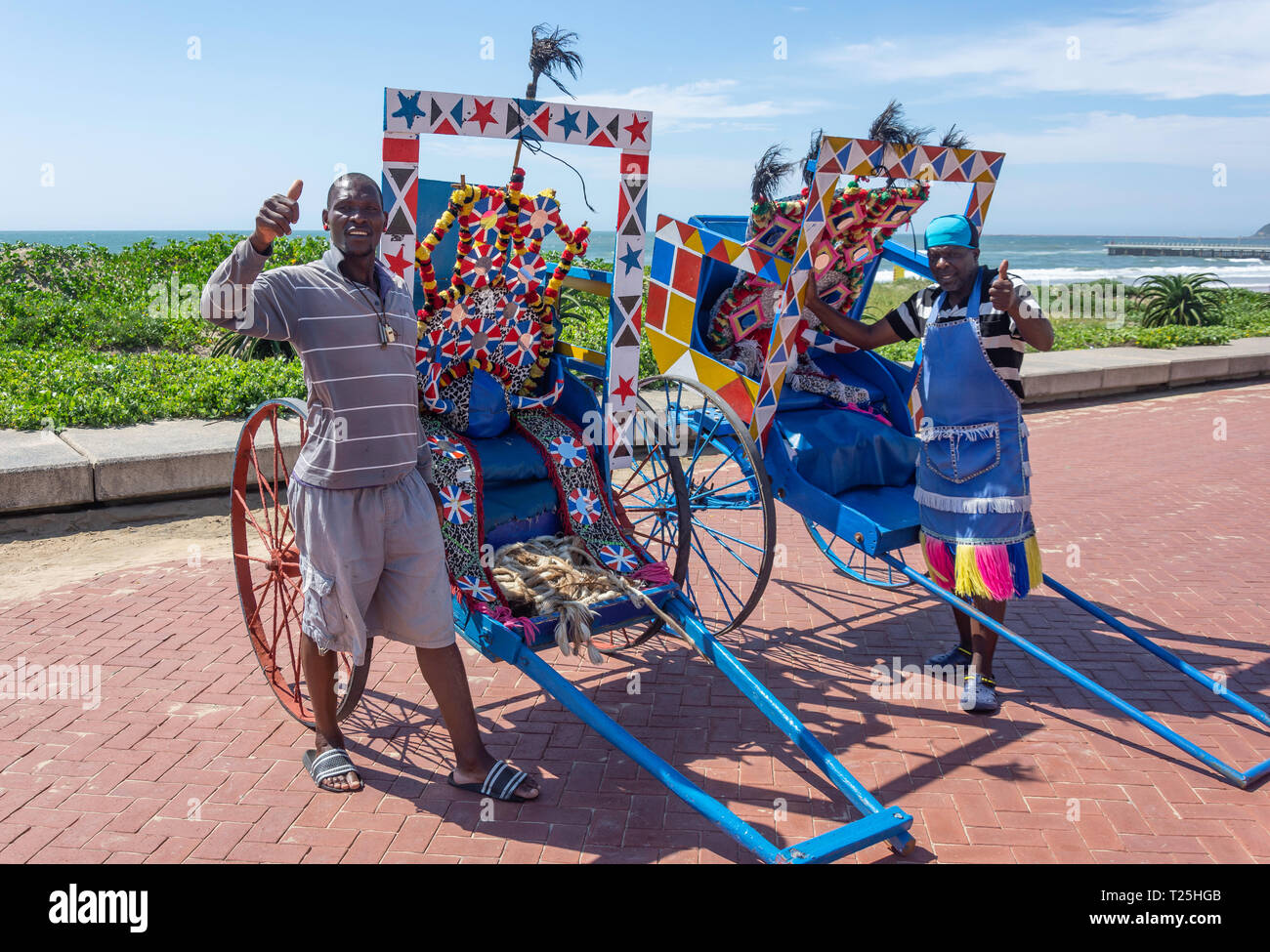 Zulu Rickshaw Drivers on beachfront, Durban, KwaZulu-Natal, South Africa Stock Photo