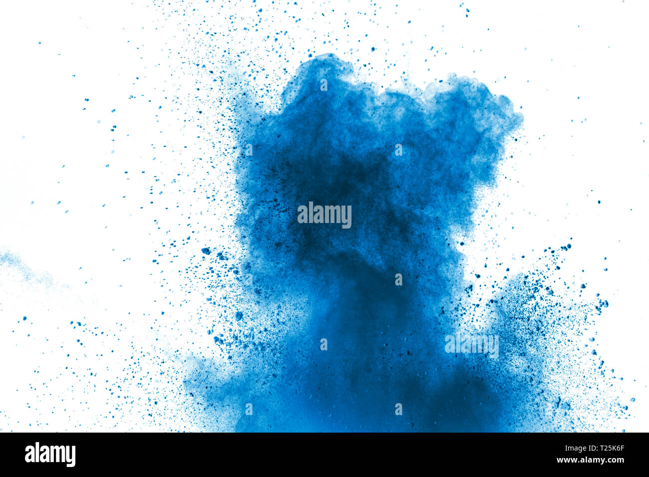 Blue color powder explosion cloud on white background.Closeup of Blue ...