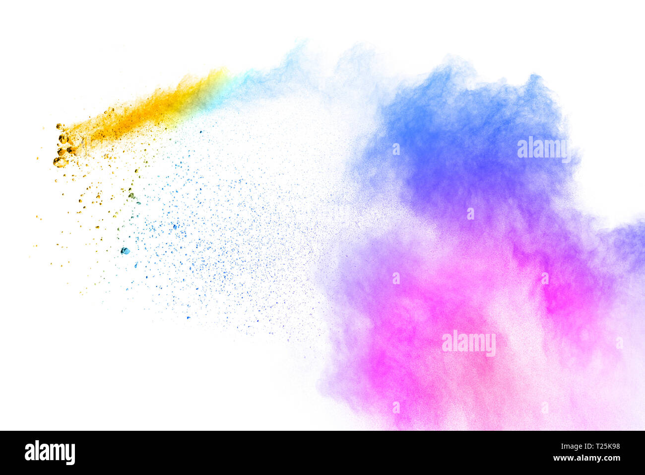 Colorful powder explosion on white background. Pastel color dust particle splashing. Stock Photo