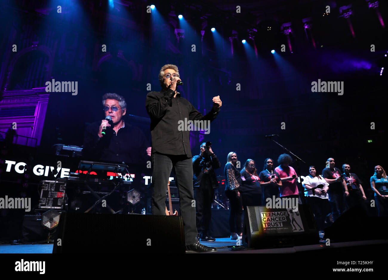 TCT's Honorary Patron Roger Daltrey CBE presents on stage to Doves during the Teenage Cancer Trust Concert, Royal Albert Hall, London. PRESS ASSOCIATION. Picture date: Friday March 29, 2019. See PA story SHOWBIZ TCT. Photo credit should read: Isabel Infantes/PA Wire Stock Photo