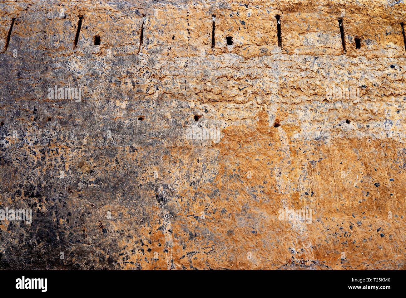 Interesting close up structures of cement and sand stone walls in high ...