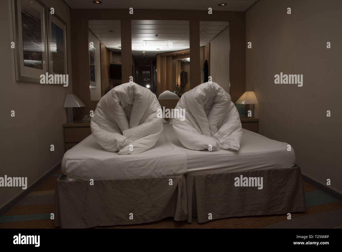 Some Cabin Stewards Form The Blankets To Human Forms On The
