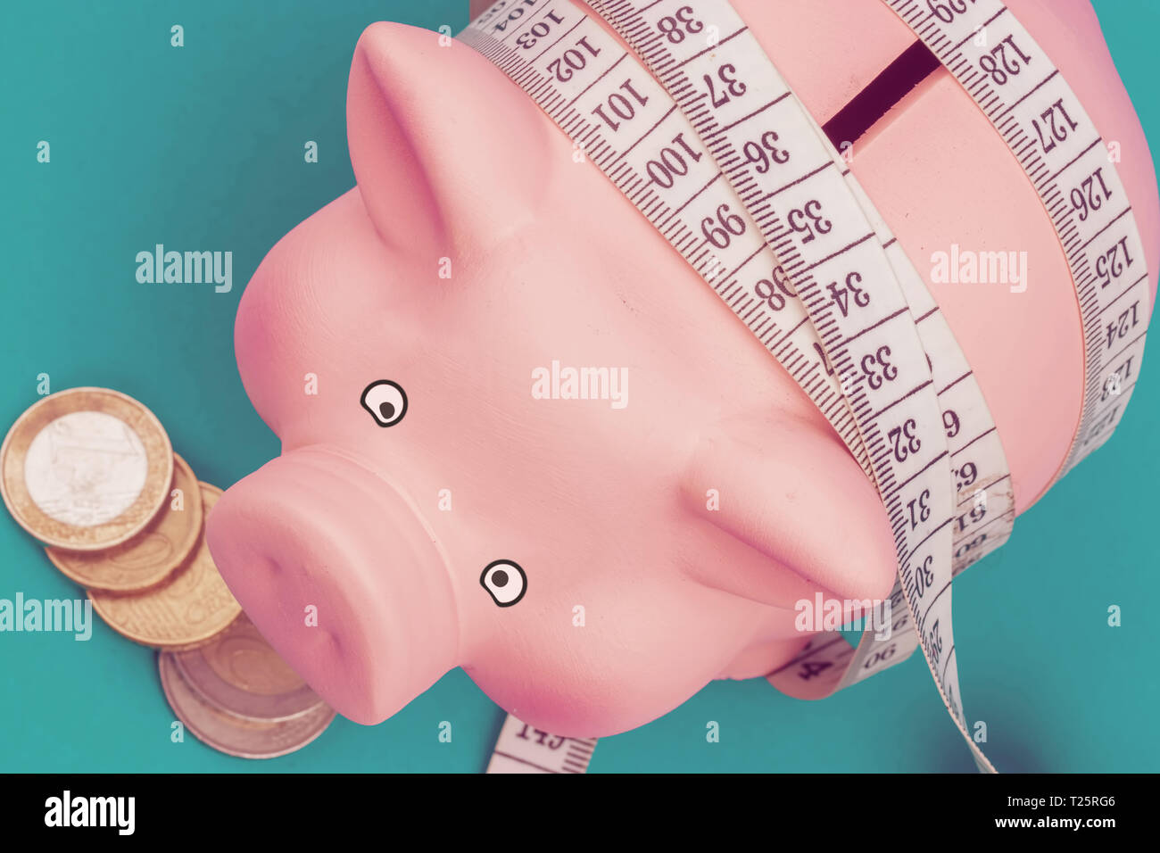 Investments and metering or counting idea. Ceramic toy pig with white ...
