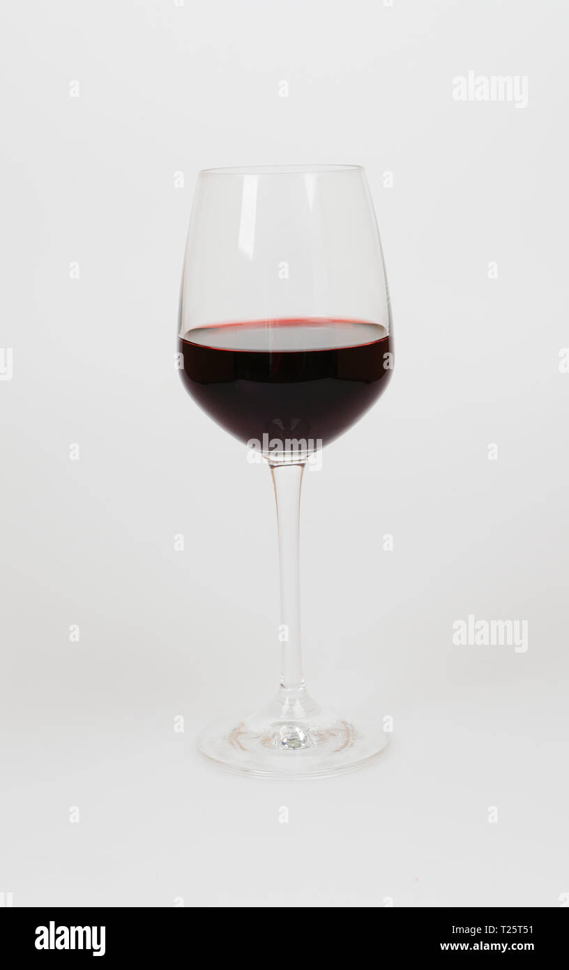 Glass of Red Wine isolated on a white background. France Stock Photo