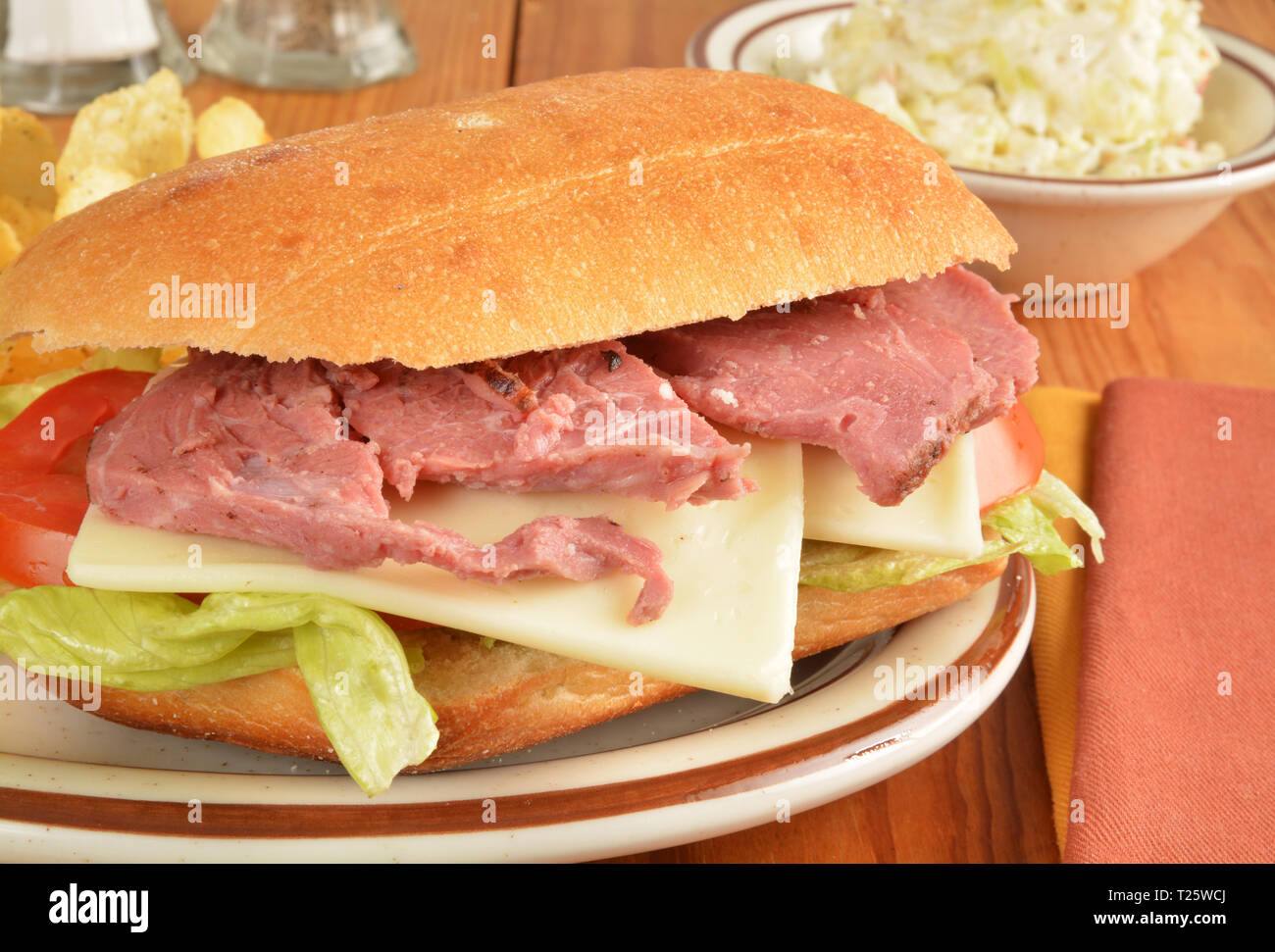 A roast beef sandwich on ciabatta bread with coleslaw Stock Photo Alamy