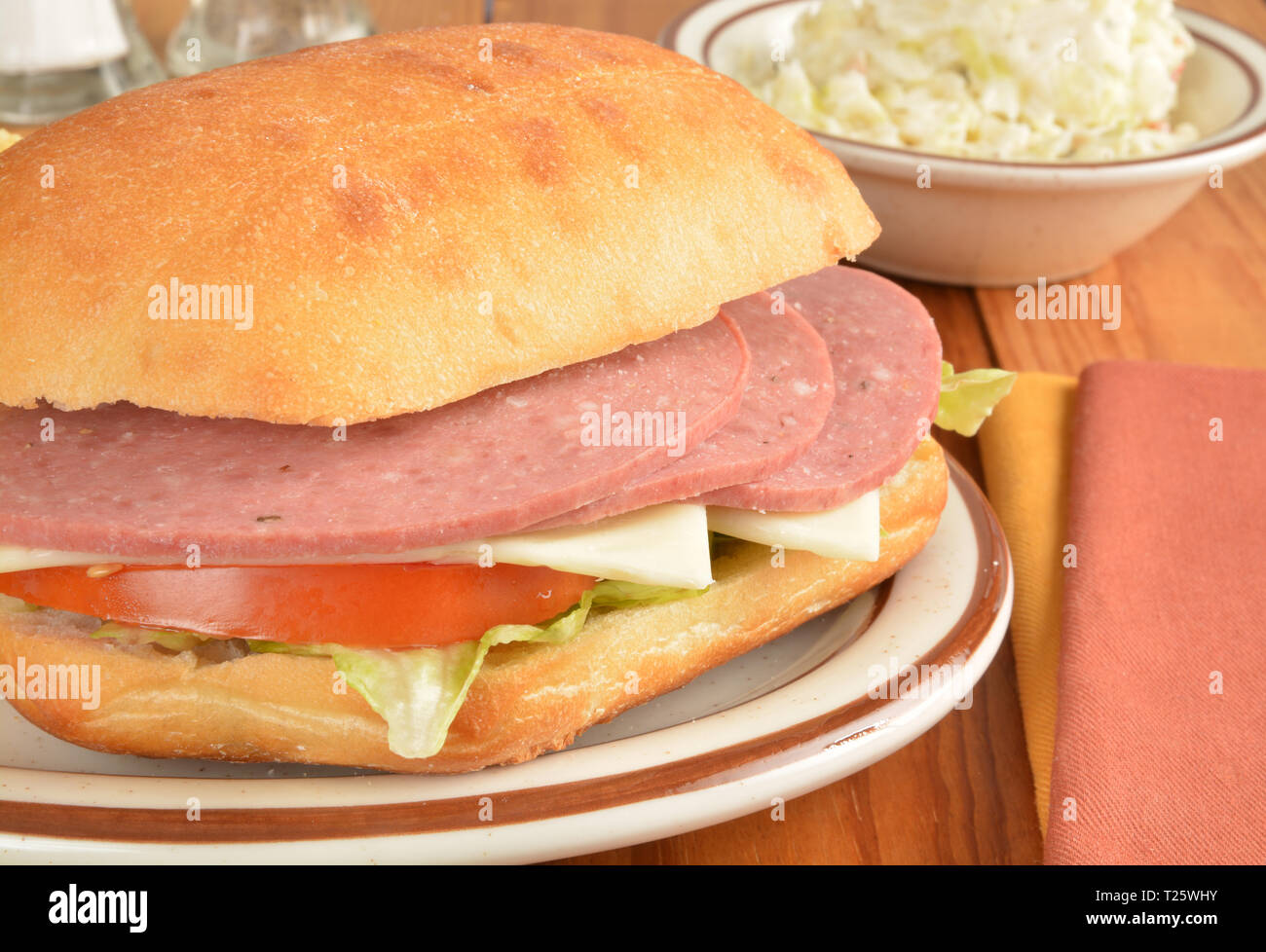 A salami and swiss cheese sandwich on a ciabatta bun Stock Photo Alamy