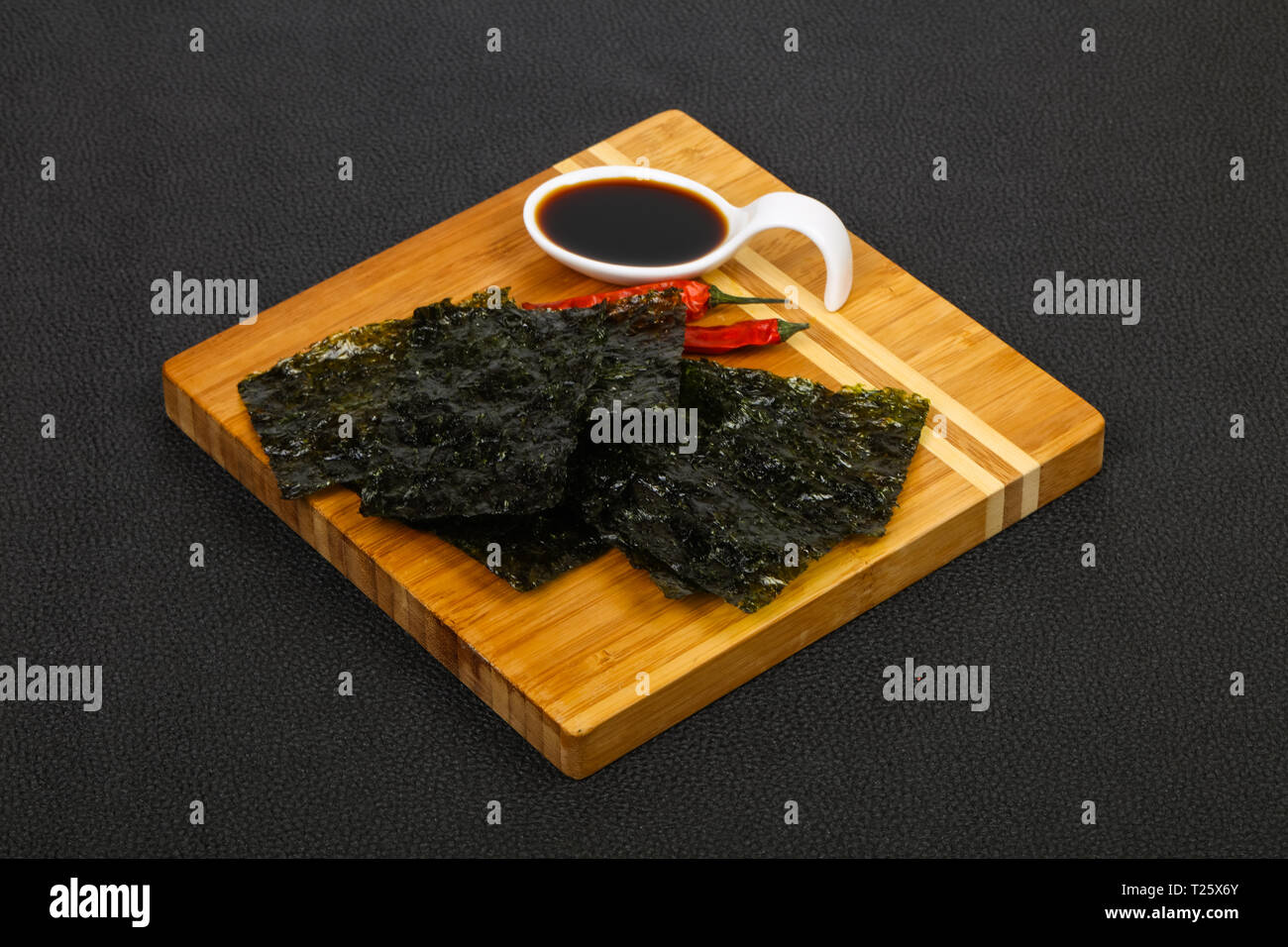 Tasty Nori chips with soya sauce Stock Photo Alamy