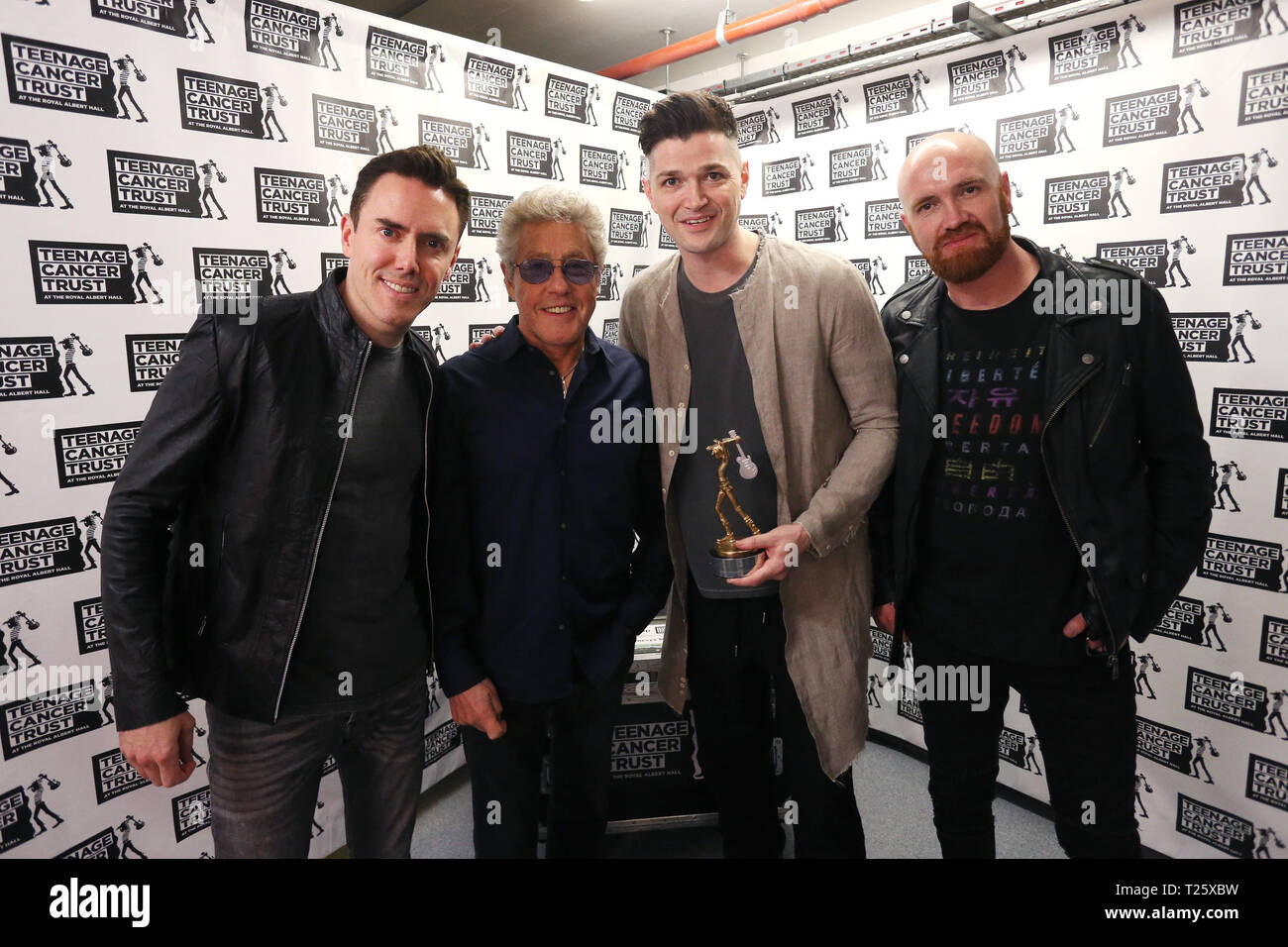 TCT's Honorary Patron Roger Daltrey CBE (second from the left) present The Script with an award during the Teenage Cancer Trust Concert, Royal Albert Hall, London. PRESS ASSOCIATION. Picture date: Saturday March 30, 2019. See PA story SHOWBIZ TCT. Photo credit should read: Isabel Infantes/PA Wire Stock Photo