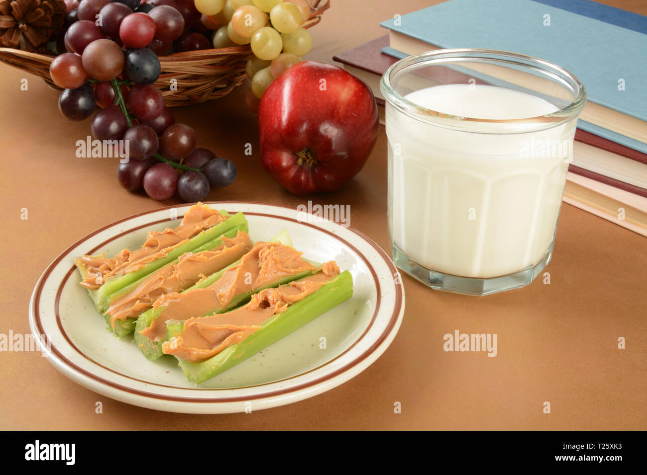 Peanut butter in celery sticks as an after school snack Stock Photo Alamy