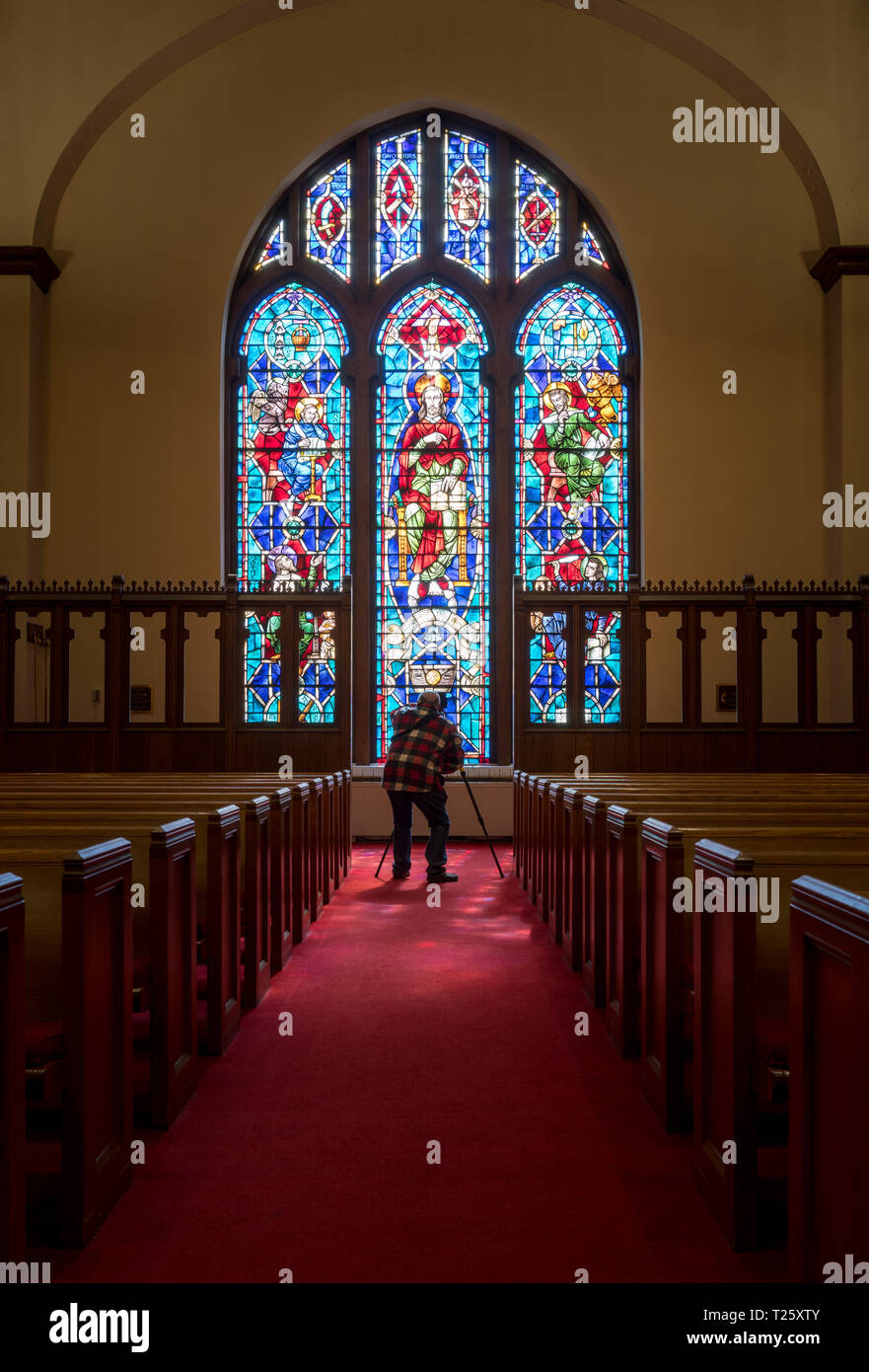 Light rays from stained glass window light photographer Stock Photo Alamy