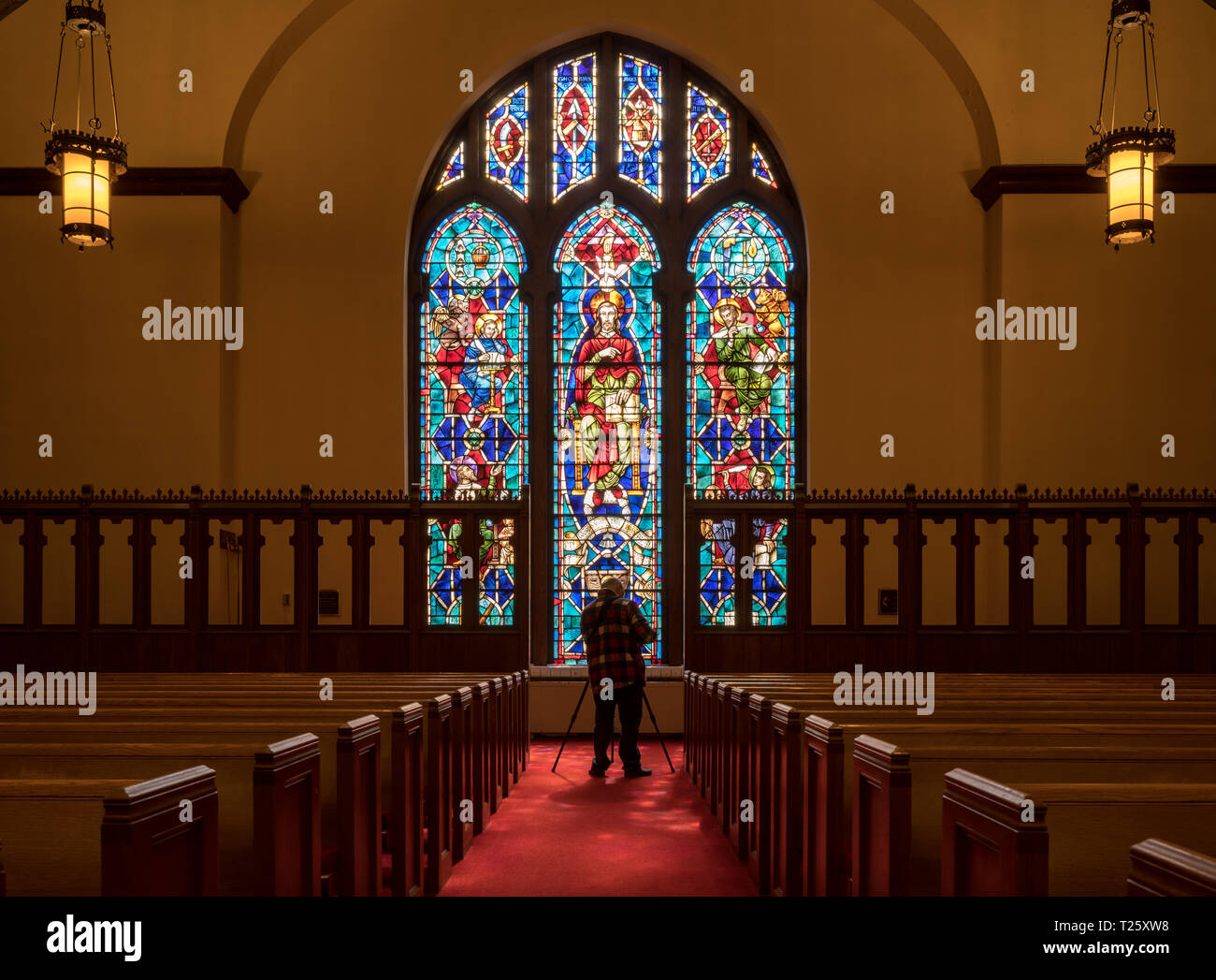Light rays from stained glass window light photographer Stock Photo Alamy