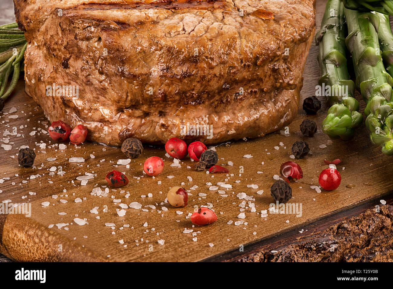 Close up on fillet mignon with asparagus on the side. Stock Photo
