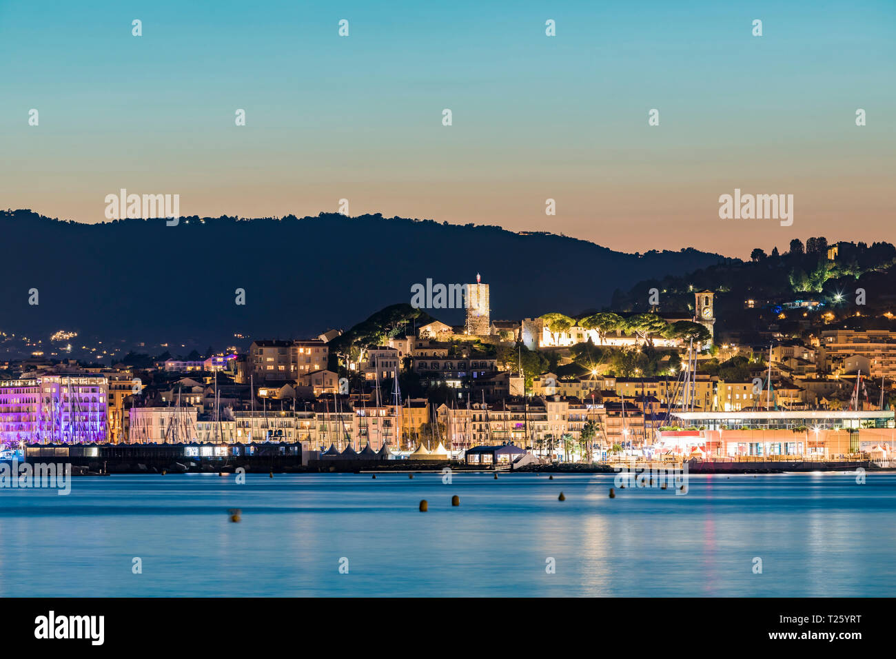 France, Provence-Alpes-Cote d'Azur, Cannes, View of Le Suquet, Old town with Castle and Chapelle Sainte-Anne in the evening Stock Photo