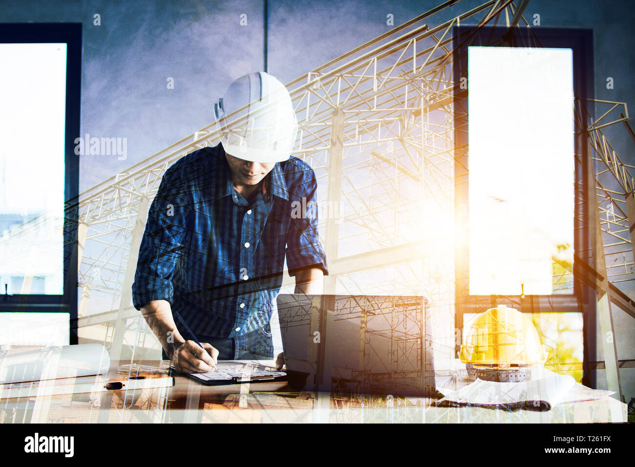 Engineer working laptop construction site hi-res stock photography and ...