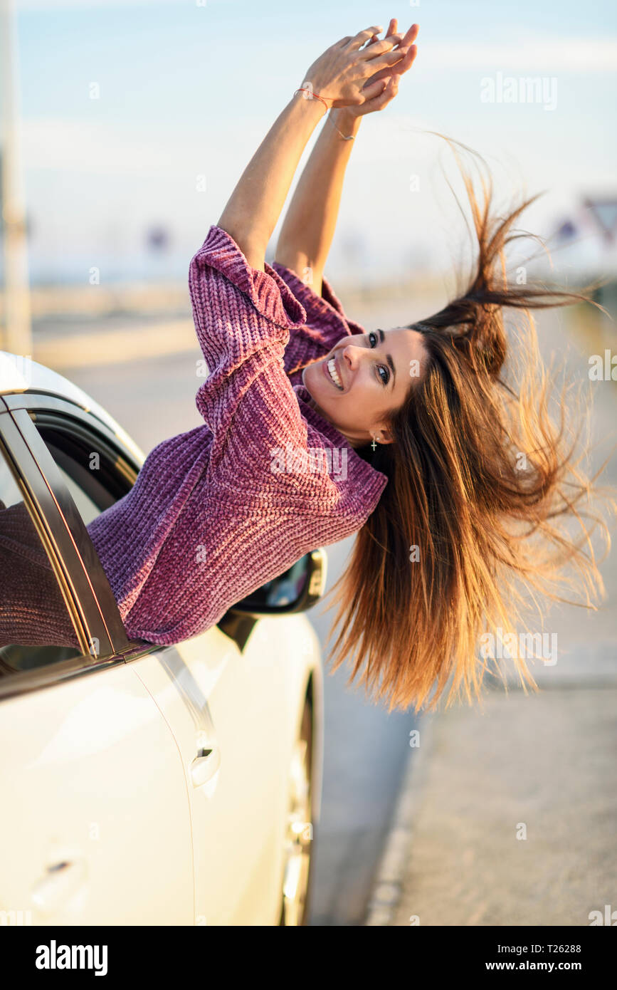 Leaning out of car