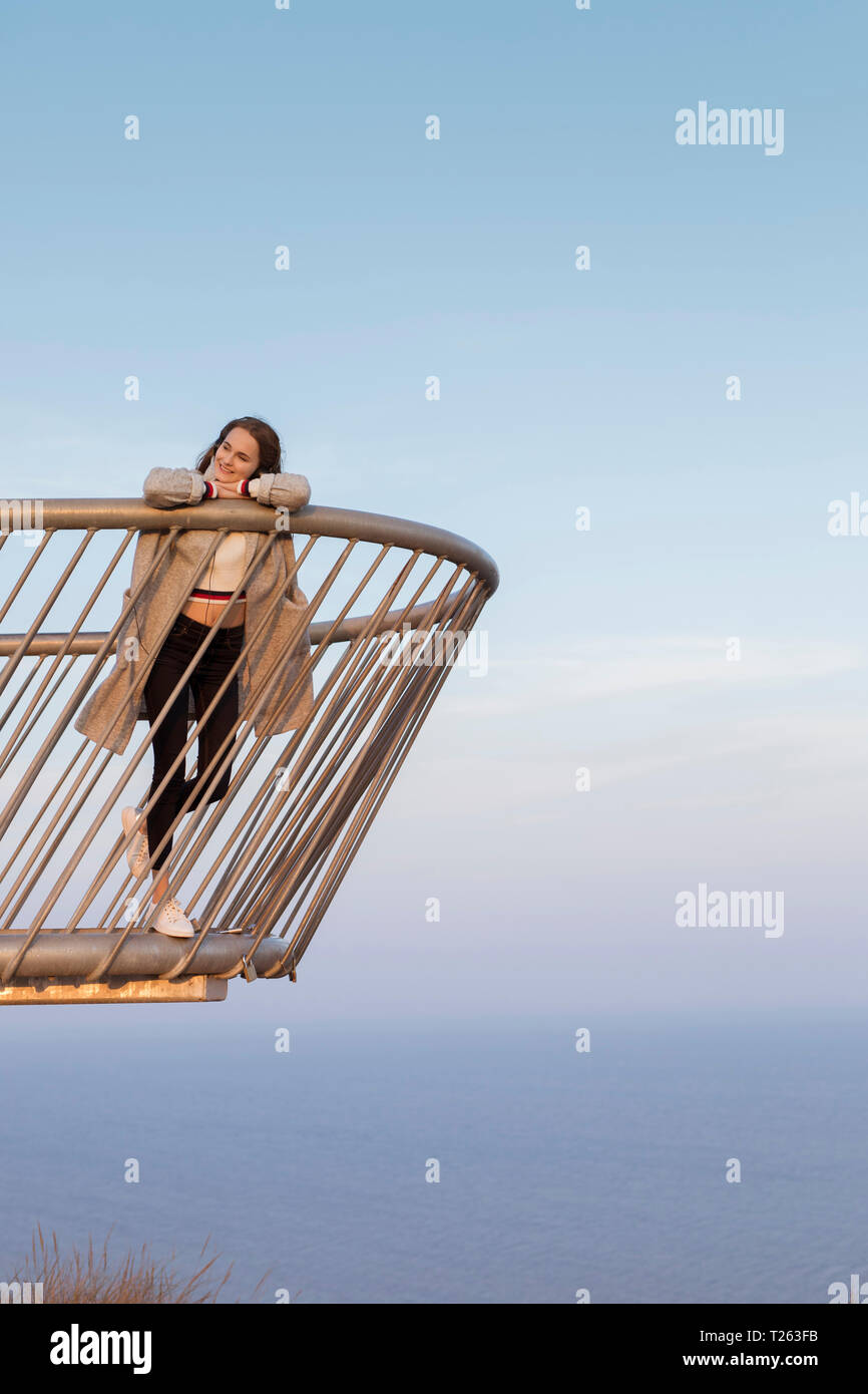 Young woman watching the sunset hi-res stock photography and images - Alamy