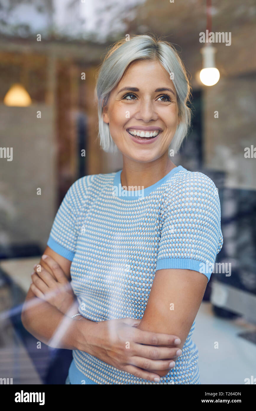 Pretty woman standing office hi-res stock photography and images - Alamy