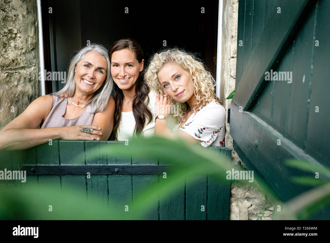 Portrait of smiling women hi-res stock photography and images - Alamy