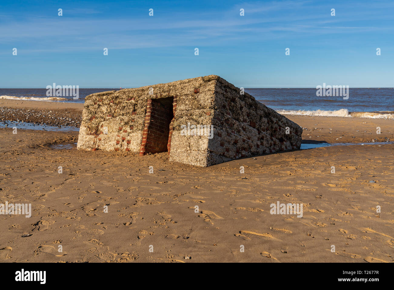 North sea coast in CaisteronSea, Norfolk, England, UK with an old