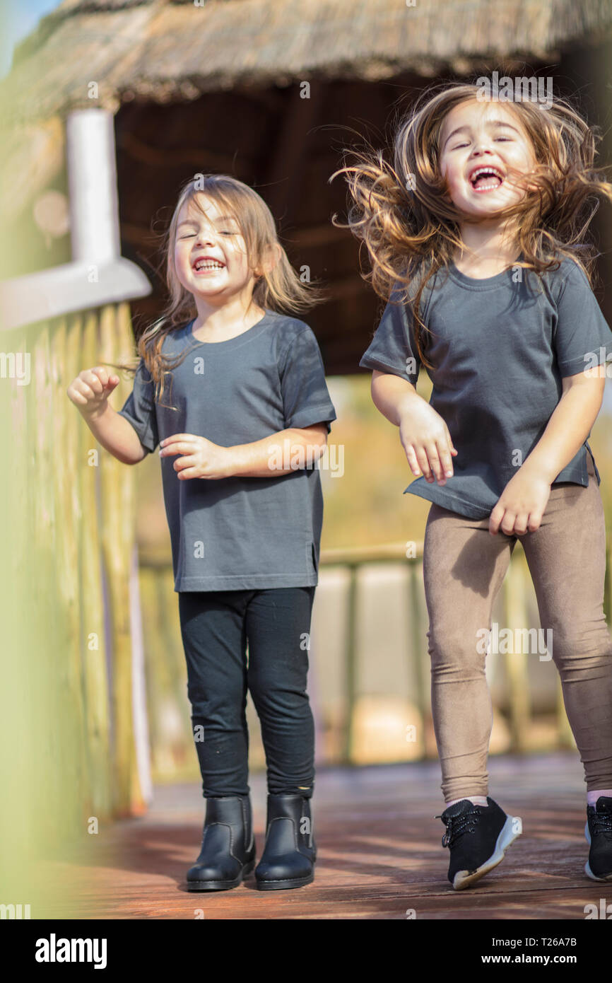 Two girls laughing hi-res stock photography and images - Alamy