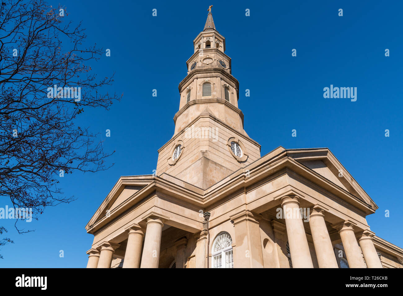 Steeple of historic St Phillip's Church along Church Street in Charleston, SC Stock Photo