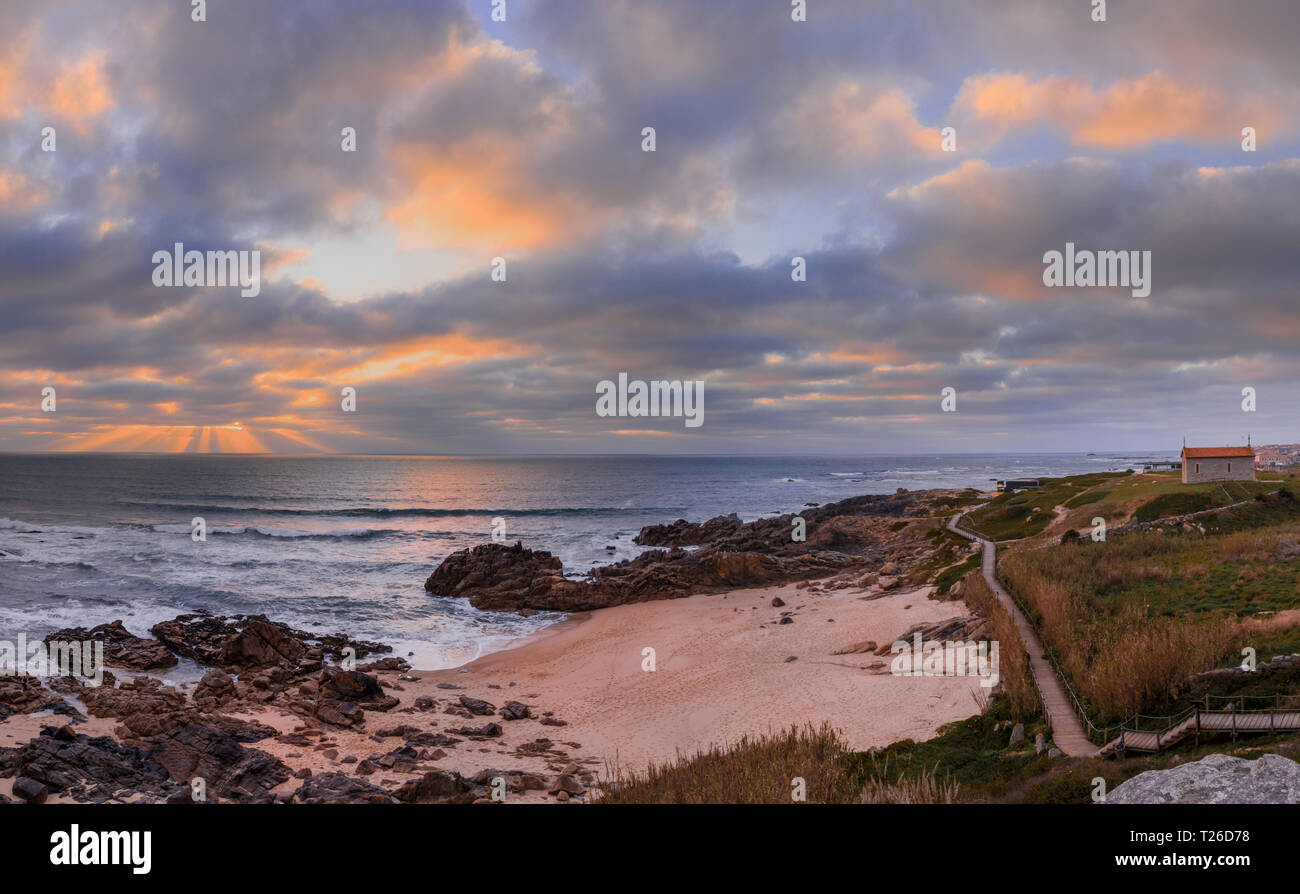 Beach of castro de São Paio at sunset Stock Photo