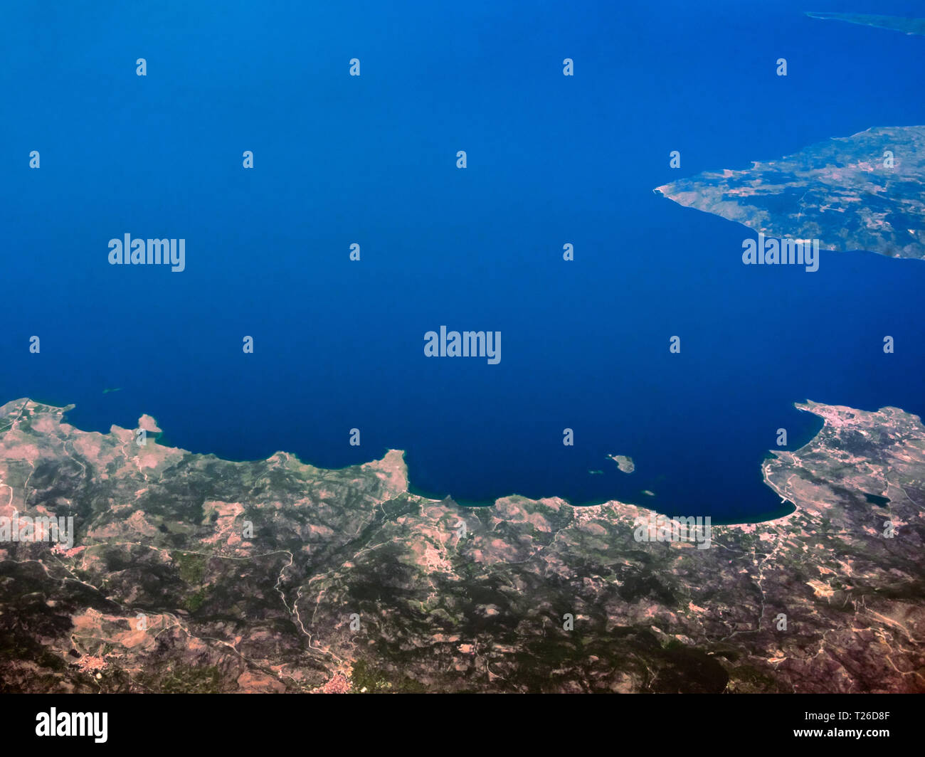 Aerial view of seashores of Greece shot from airplane Stock Photo