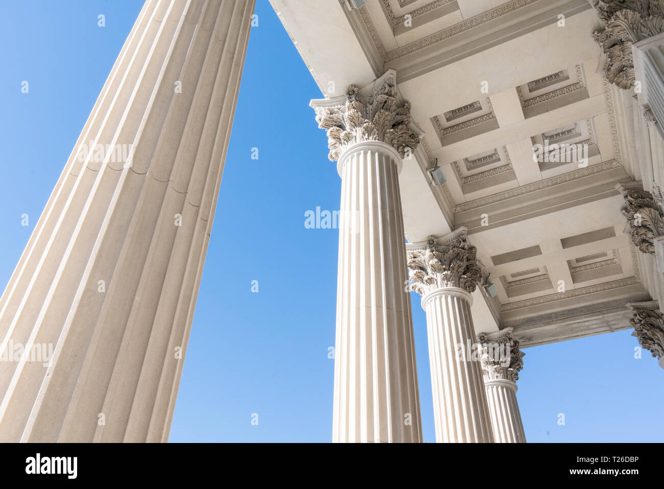 Top Detail of Stone Greek Revival Architectural Columns Stock Photo