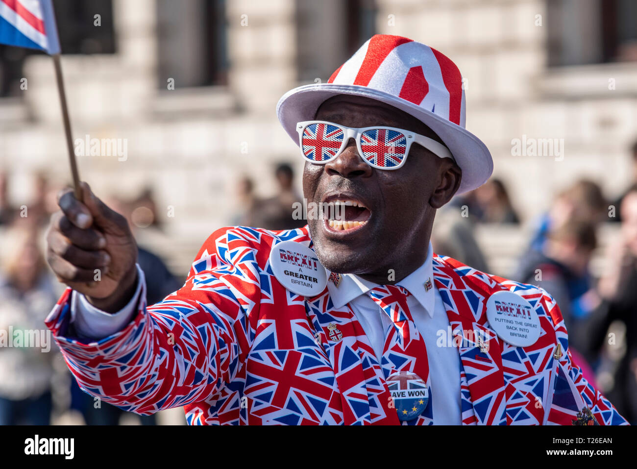 Demonstrator Joseph Afrane in Union Jack Flag British suit at the Brexit Betrayal march by Brexiteers protesting against the UK government not leaving Stock Photo