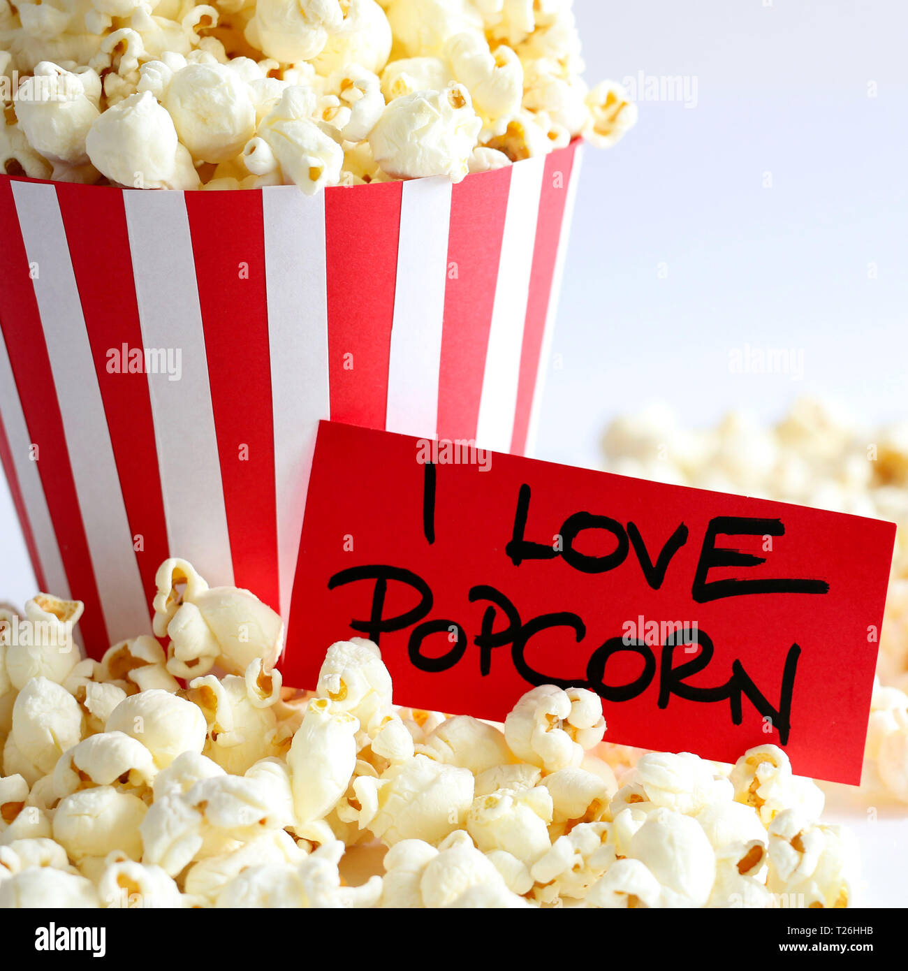 Popcorn bag and tag I love popcorn isolated on white background Stock