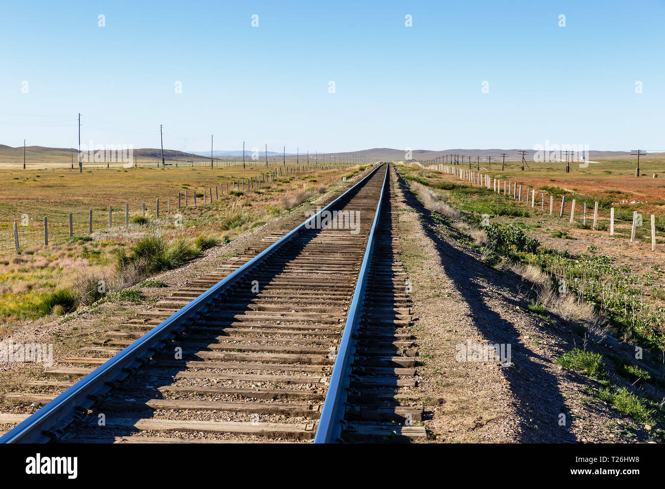 Trans-Mongolian railway, single-track railway in the Mongolian steppe, Mongolia Stock Photo