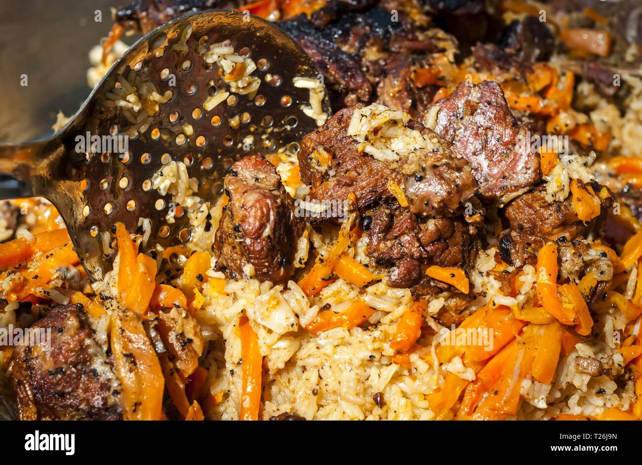 Rice pilaf, also known as plov or pilau, a national cuisine dish in