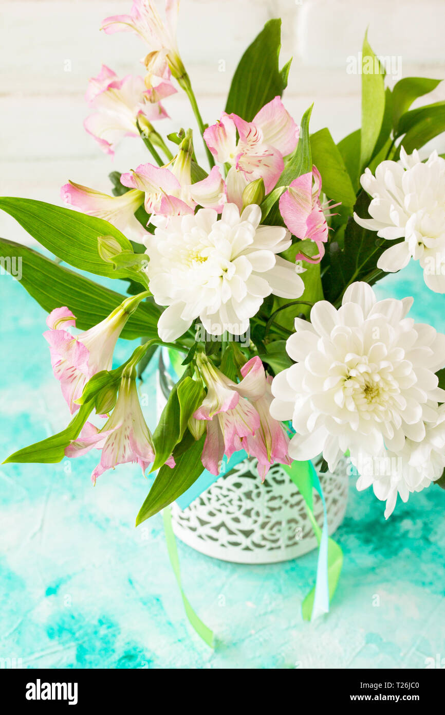 Holidays Easter table Setting with spring flowers. Stock Photo