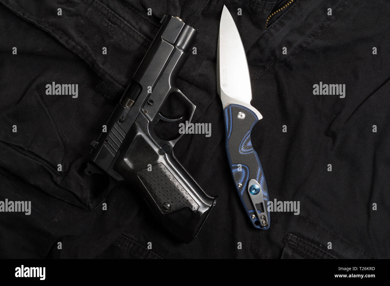 Firearm and knife. Weapons and men's clothing. Top Stock Photo Alamy