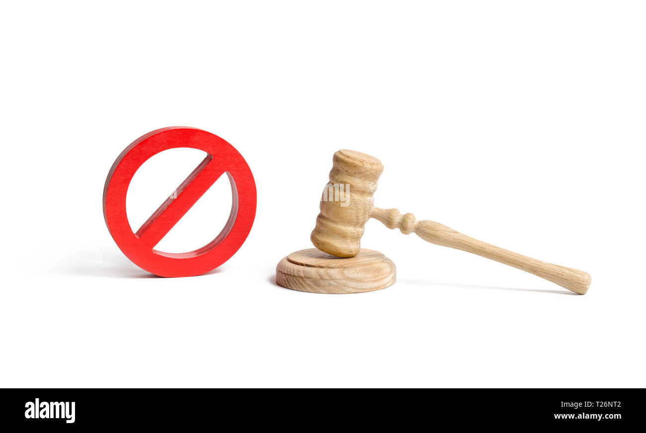 Judge's gavel and NO symbol on an isolated background. The concept of prohibiting and restrictive laws. Prohibitions and criminalization, repression,  Stock Photo