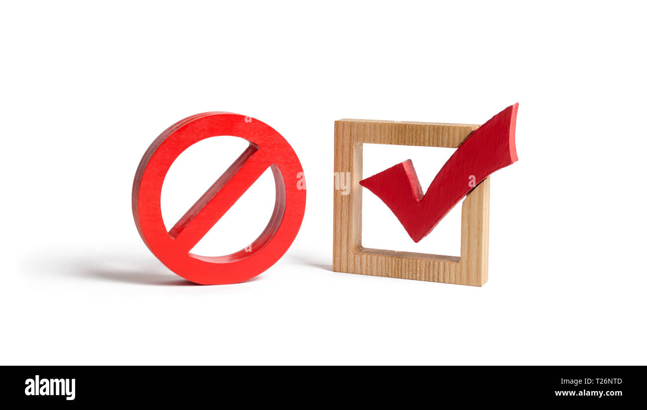 A red check mark and a NO symbol on an isolated background. lack of choice or election of the state. Restriction of rights and freedoms. No option, un Stock Photo