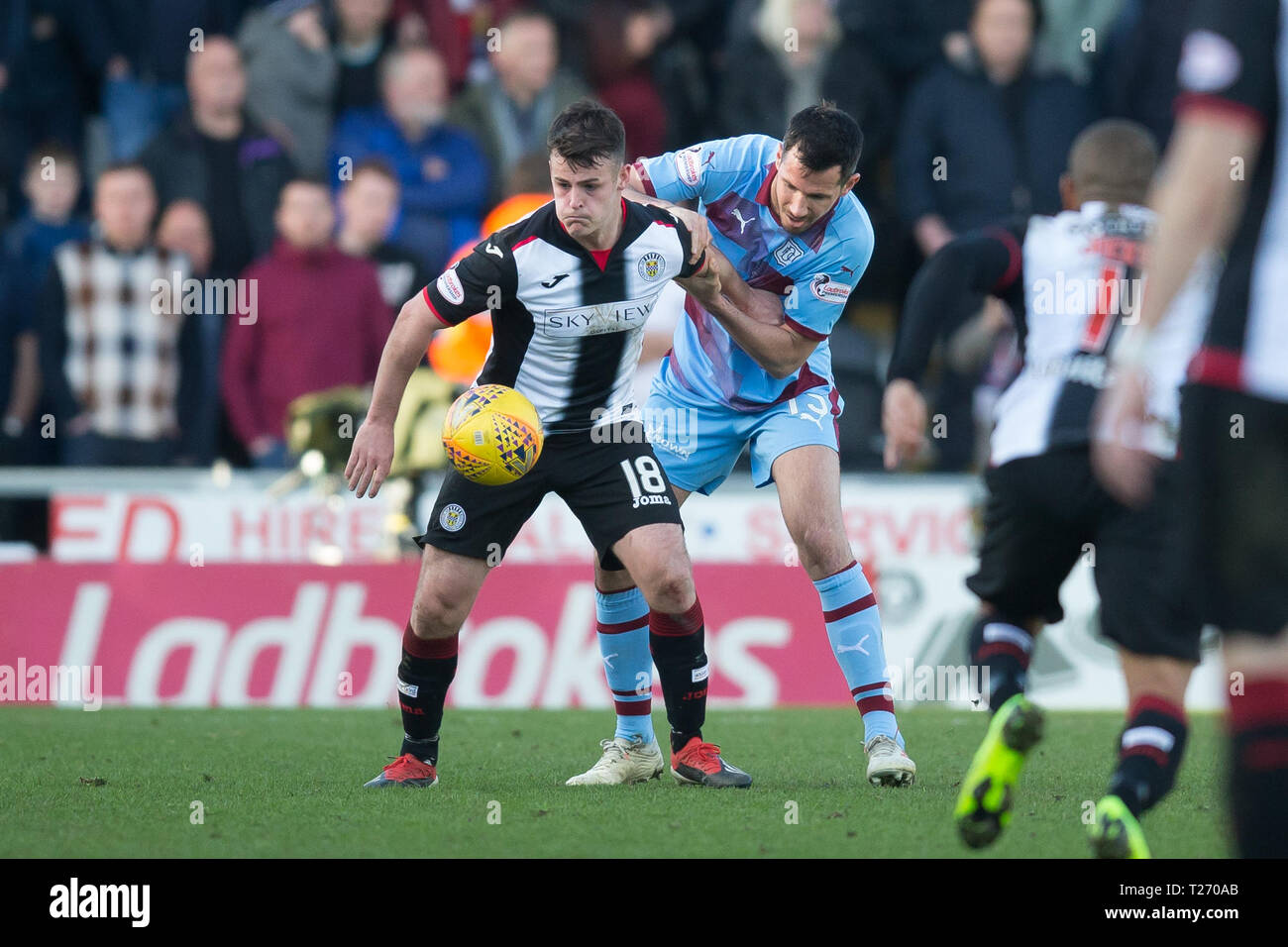 The Simple Digital Arena, Paisley, Scotland, UK. 30th March 2019, Ladbrokes Premiership football, St Mirren versus Dundee; Danny Mullen of St Mirren challenges for the ball with Ryan McGowan of Dundee Stock Photo