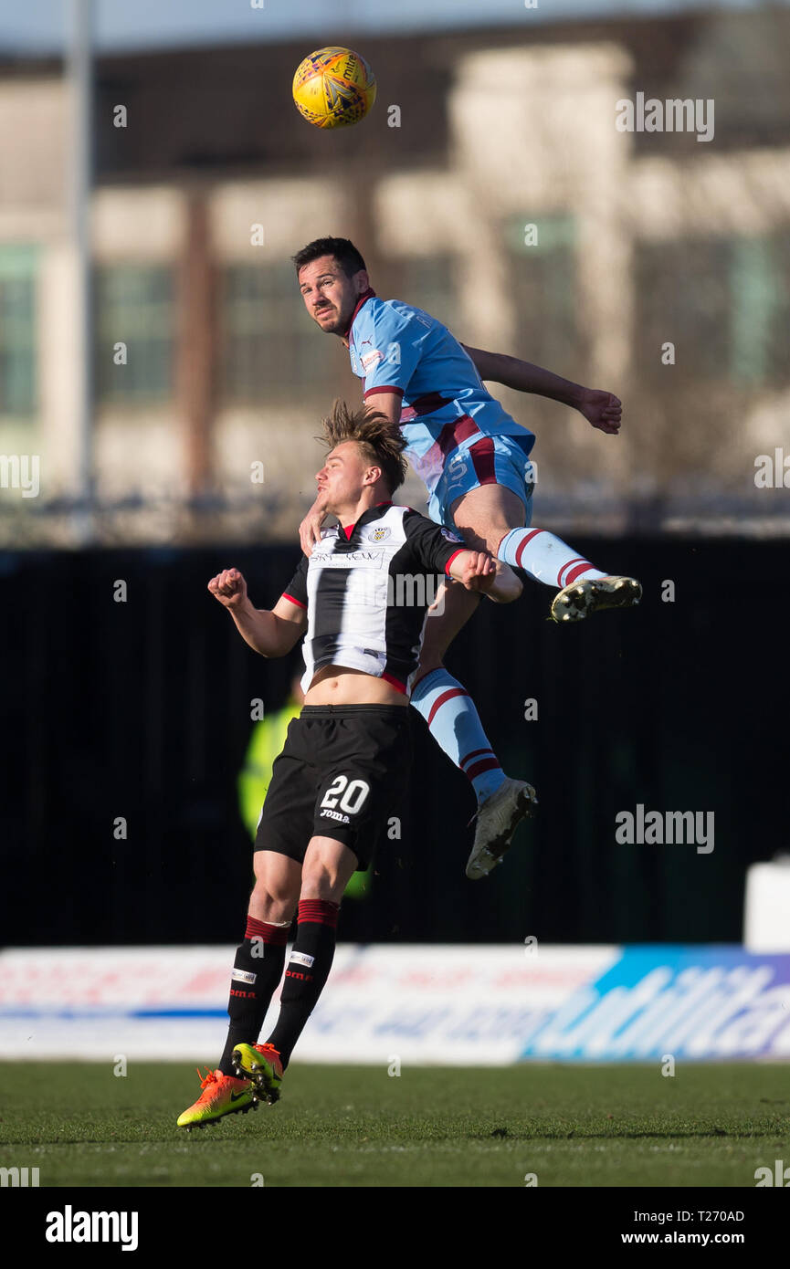 The Simple Digital Arena, Paisley, Scotland, UK. 30th March 2019, Ladbrokes Premiership football, St Mirren versus Dundee; Ryan McGowan of Dundee competes in the air with Cody Cooke of St Mirren Stock Photo